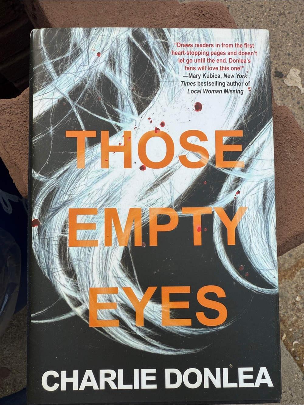 Those Empty Eyes by Charlie Donlea - Black & Orange Hardcover